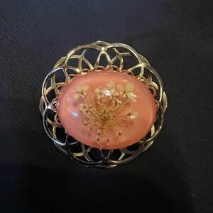 Vintage brooch with inset dried flowers